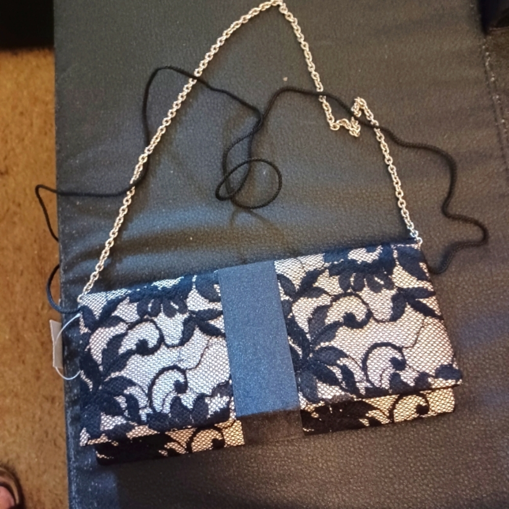 THIS IS A BLACK LACE OVER BEIGE EVENING OR ANYTIME BAG.